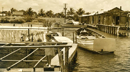 Photo, View of nets, fishing boat and:Riviera Beach, FL, 1939, Charles Foster.