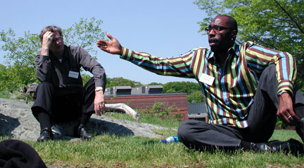 Teachers discussing the days lessons on a warm sunny day. TAH: History Connected