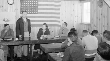 Photo, Roy Takano [i.e., Takeno] at town hall meeting, LOC
