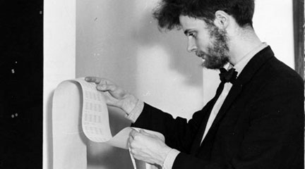 Photo. Student working in Statistics Machine Room, 1964. Flickr