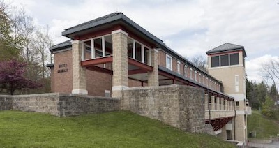 View of Library built on a hill but extends off of the hill.