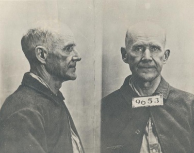Mug shot of Eugene Debs. His number reads 9653.