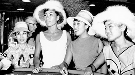 Photo, "The Kim Sisters at a table in Reno"