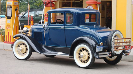 Photo, Model A Ford in front of antique gas pumps, August 4, 2007, Flickr