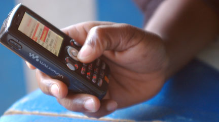 Photo, Hand Holding a Mobile Phone, Jun. 24, 2008, whiteafrican, Flickr