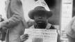 Photo, African American boy selling The Washington Daily News - sign on his hat reads, 'Have you read The News? One cent' - headline reads Millionaire tax rends G.O.P., November 8, 1921, Library of Congress Photo, African American boy. . . , November 8, 1921, Library of Congress