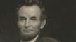 Portrait of Lincoln holding a document in his left hand, facing slightly left. Portrait of Lincoln holding a document in his left hand, facing slightly left.