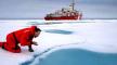 Photo, Russ Hopcroft, from the University of Alaska Fairbanks, takes a sip from one of the many meltponds scattered around the ice, 2002, Ian MacDonald, National Oceanic and Atmospheric Administration Photo, Russ Hopcroft, from the University . . . , 2002, Ian MacDonald, NOAA