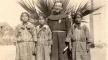 Photo, St. John's Mission, Komatke, Gila River Reservation, AZ: Fr. Augustine and 3 students, Augustine Schwarz, Mission to Arizona, 1916–1940: Father Augustine Schwarz, O.F.M. Photo, St. John's Mission, Komatke, Gila River Reservation, AZ