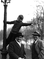 Photo, MacJannet student up a lamp post as Emory Foster, ca. 1930, 1930