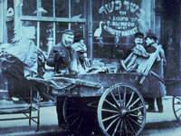 Photo, Pushcart peddler in Lower East Side, NY, early 1900s, The History Box