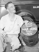 Photo, Man with war bond ticket. . . , 1943, The Making of Modern Michigan