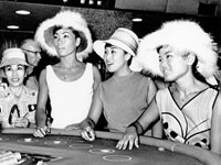 Photo, "The Kim Sisters at a table in Reno"